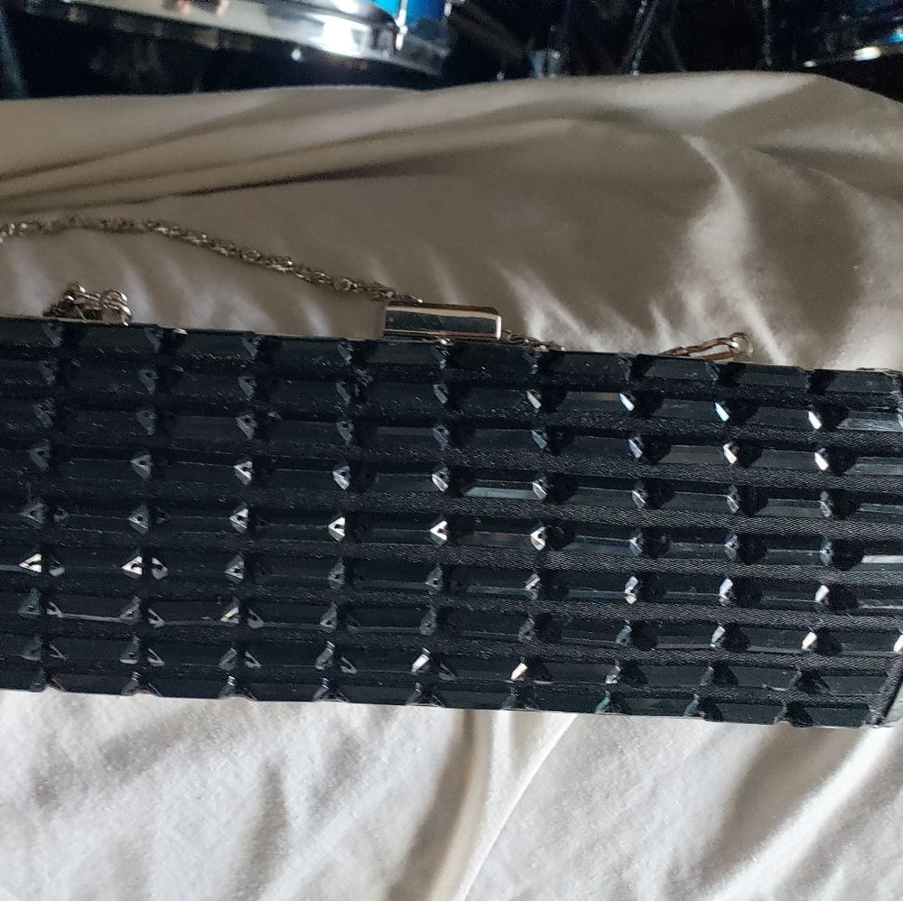 Black hard shell Clutch Unbranded Clasp Top inside zip Pocket removeable chain